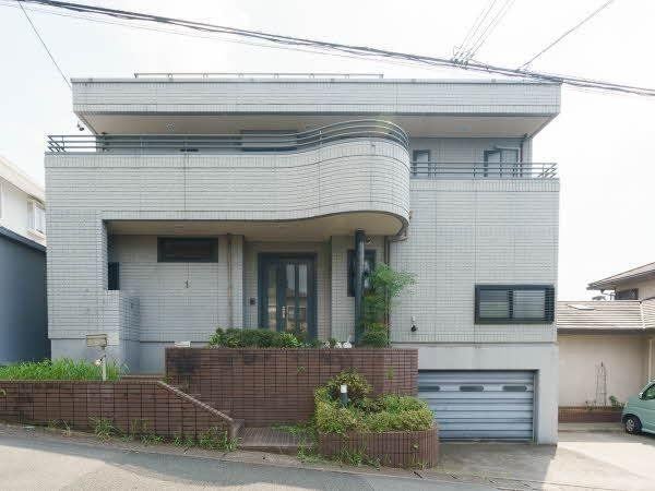 3-Story House with Built-in Garage by Sekisui House - Photo 1