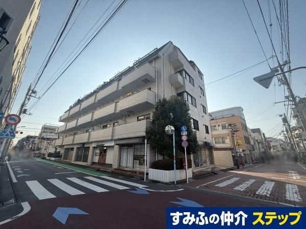 Renovated 2LDK Apartment on Top Floor - Photo 1