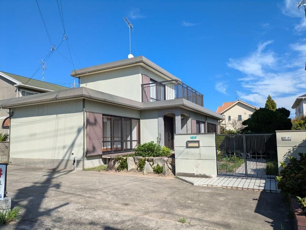 House with Exterior Work Near Major Commercial Facilities - Photo 1