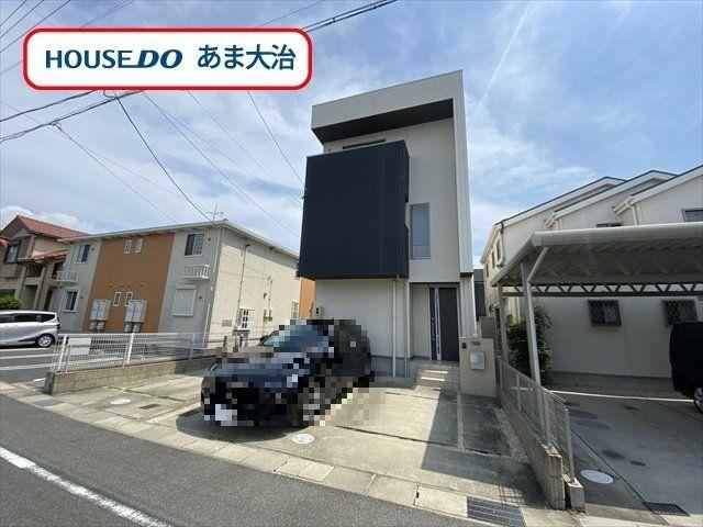 3-Story Home with Living Room Staircase and Solar Panels - Photo 1