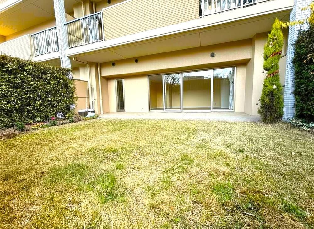 Charming 3LDK Apartment with Private Garden in Hachioji - Photo 1